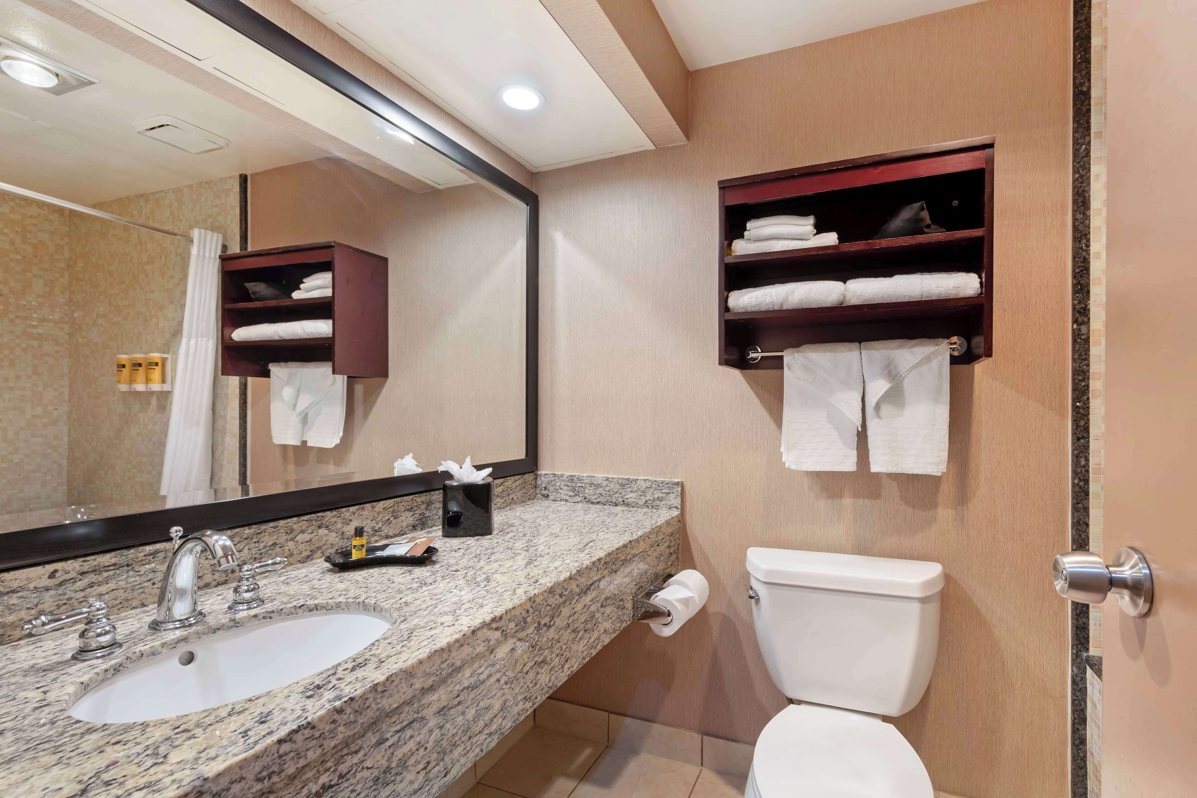 deep-soaking bathtub, free toiletries, hair dryer, towels