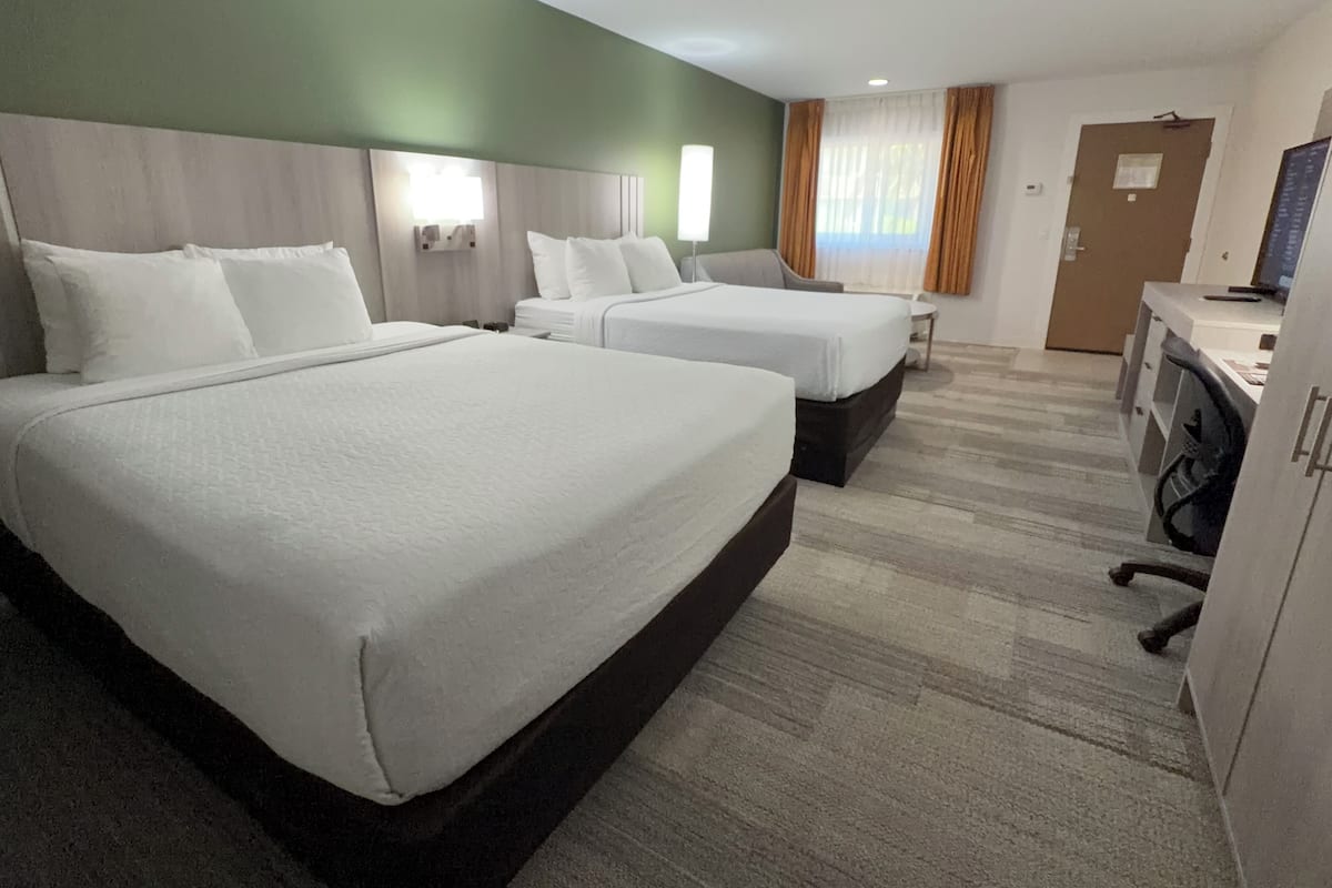 Pillowtop beds, desk, laptop workspace, blackout drapes