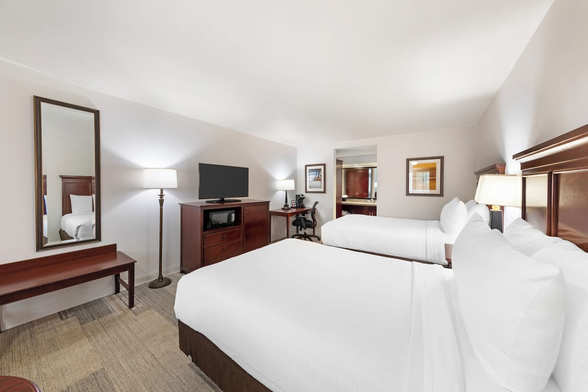 Pillowtop beds, desk, laptop workspace, blackout drapes