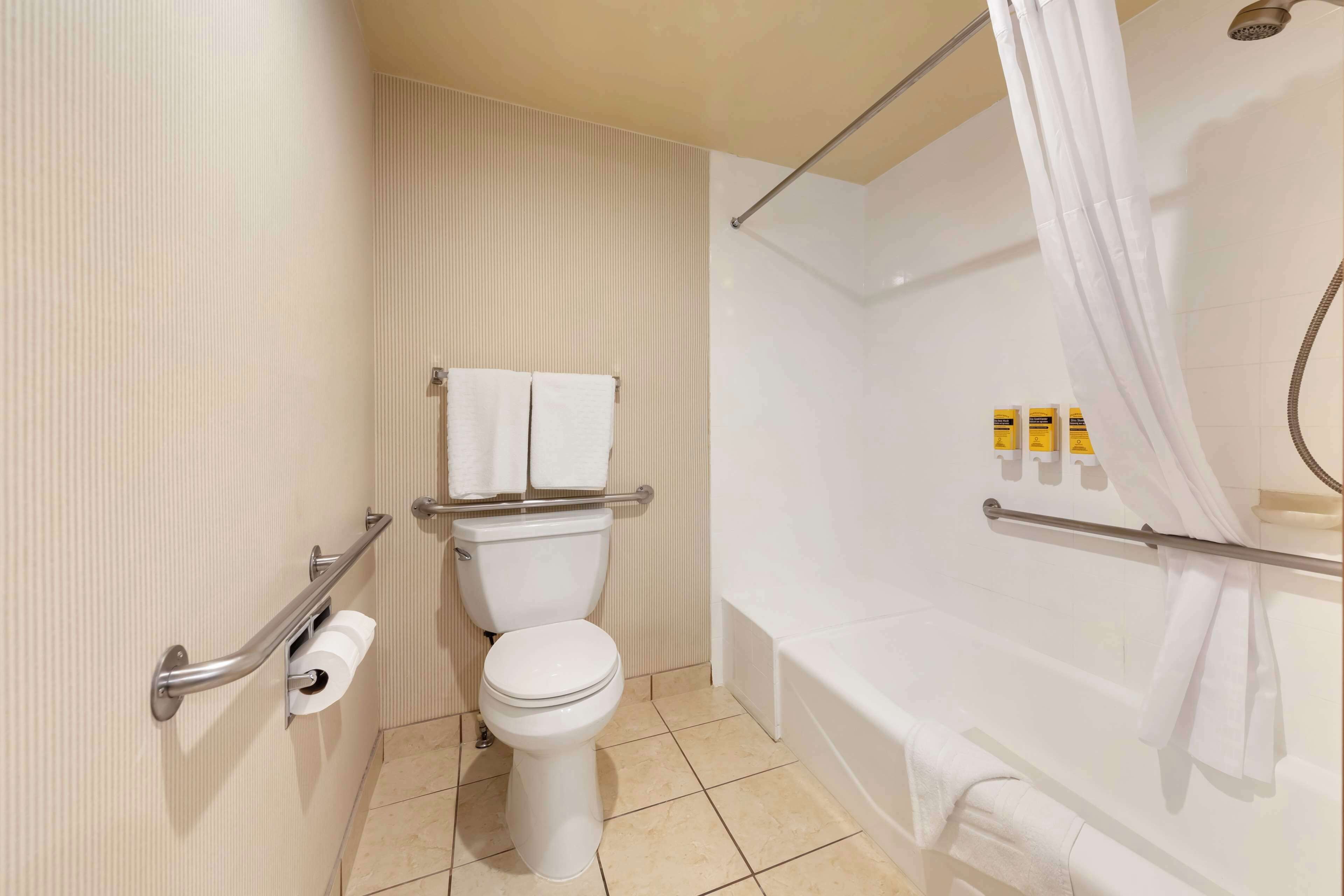 deep-soaking bathtub, free toiletries, hair dryer, towels