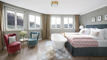 XL Room, Bathtub, Separate Living Room | Premium bedding, in-room safe, blackout curtains, soundproofing