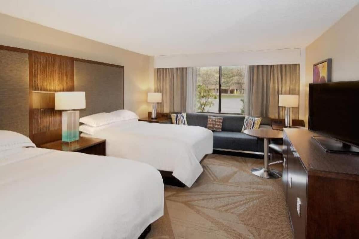 Premium bedding, down comforters, pillowtop beds, in-room safe