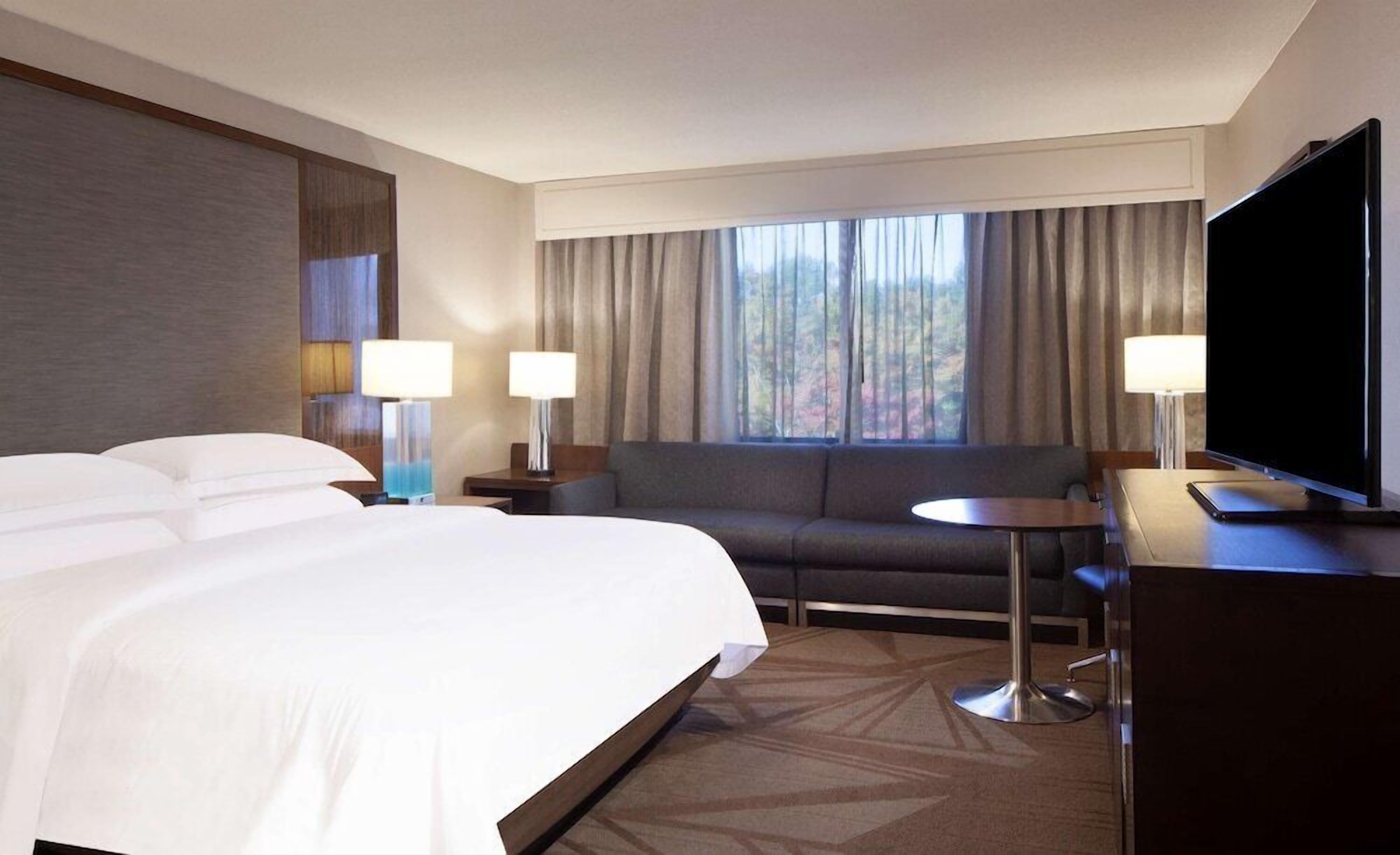 Premium bedding, down comforters, pillowtop beds, in-room safe