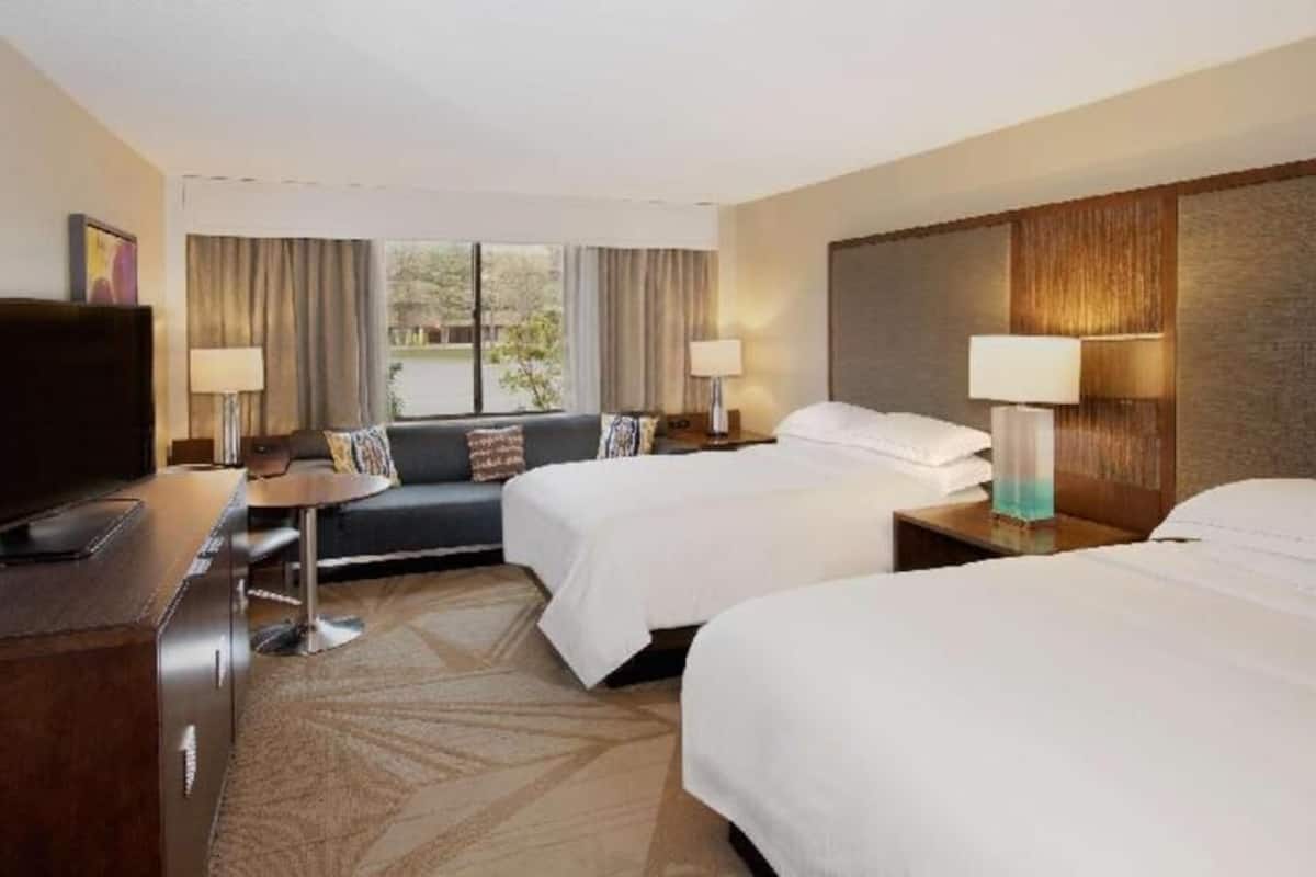 Premium bedding, down comforters, pillowtop beds, in-room safe