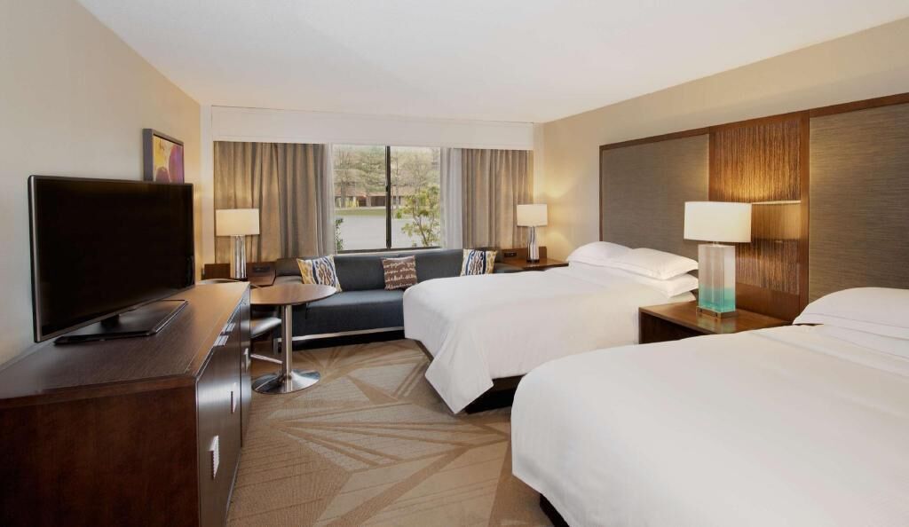 Premium bedding, down comforters, pillowtop beds, in-room safe