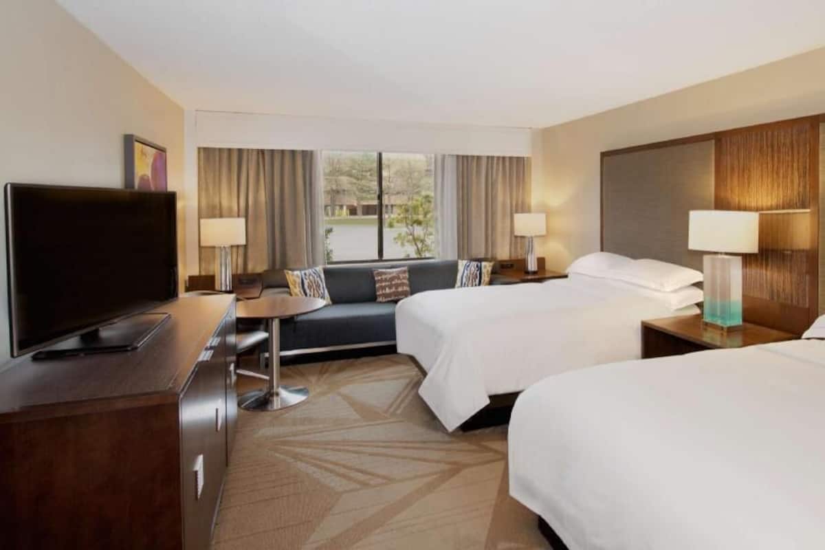 Premium bedding, down comforters, pillowtop beds, in-room safe