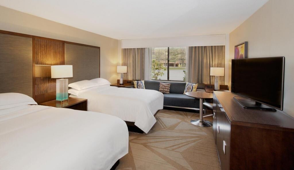 Premium bedding, down comforters, pillowtop beds, in-room safe