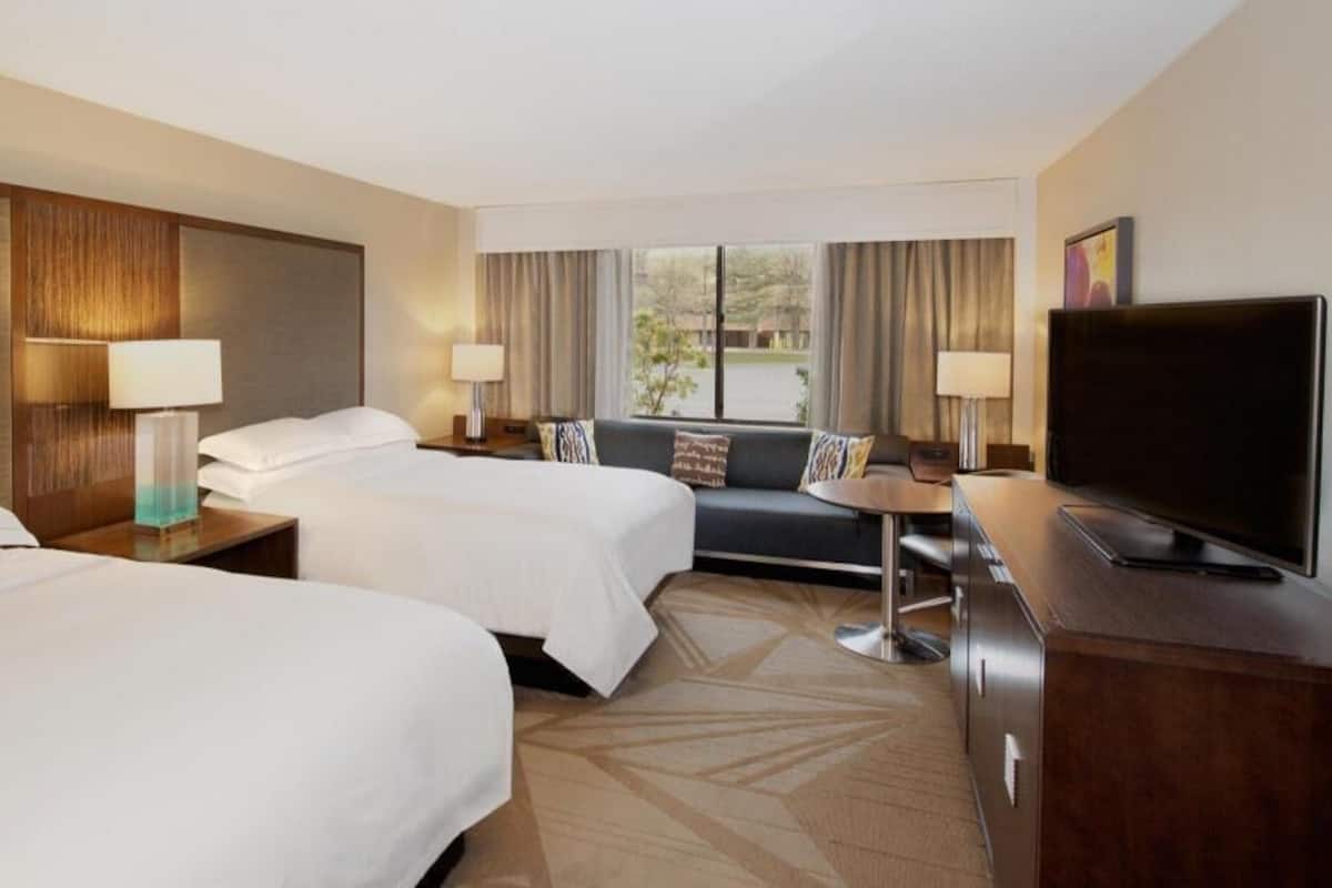 Premium bedding, down comforters, pillowtop beds, in-room safe