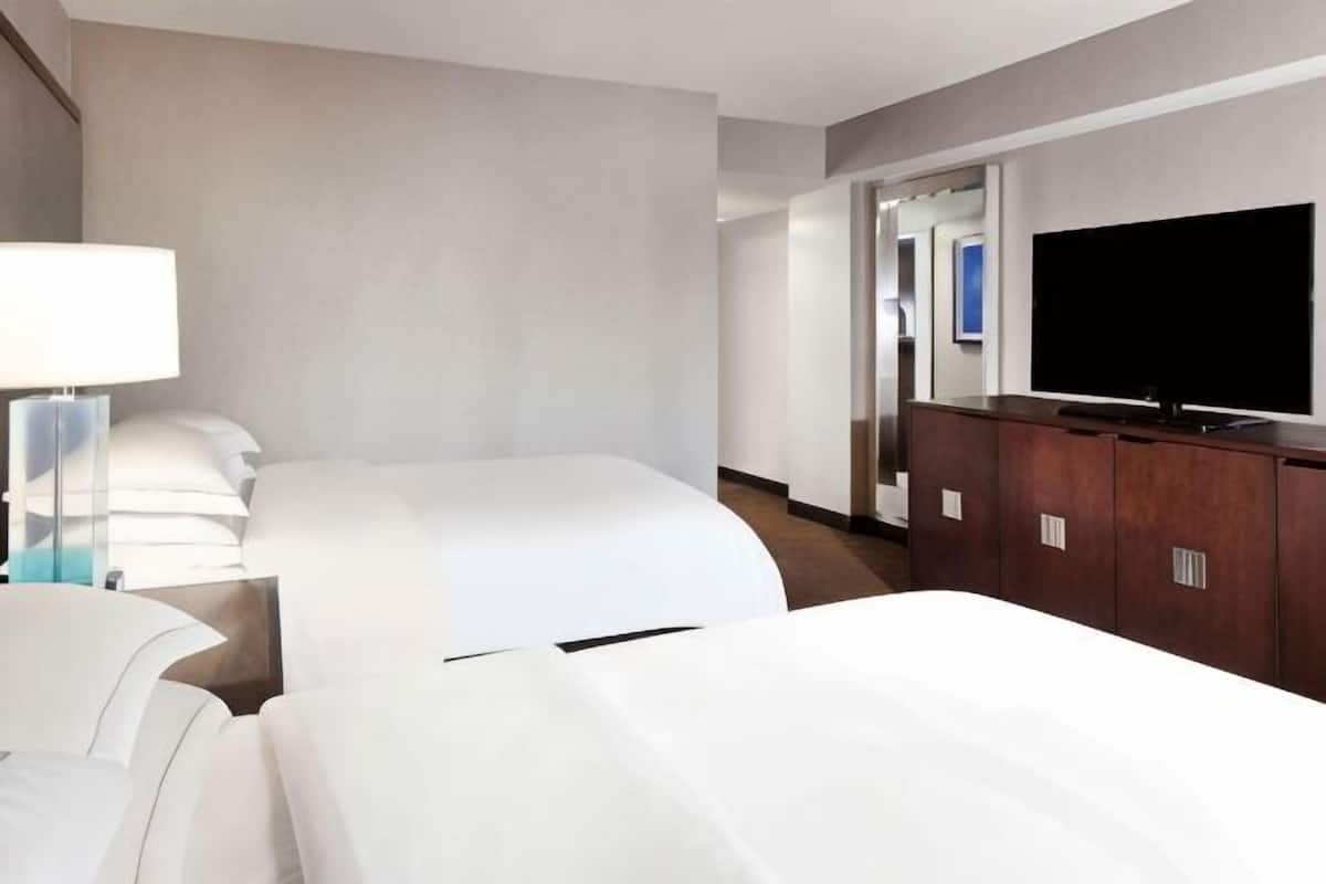 Premium bedding, down comforters, pillowtop beds, in-room safe