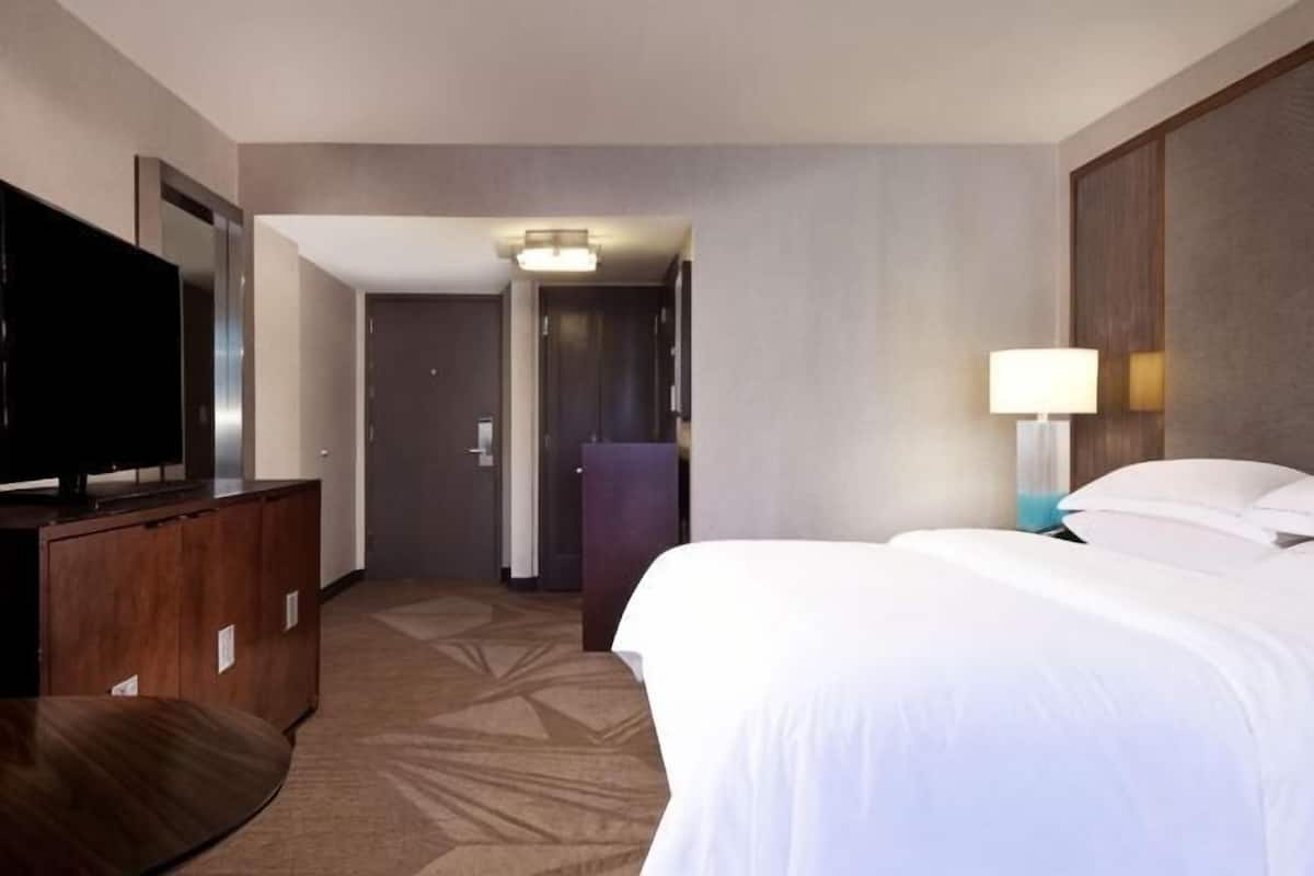 Premium bedding, down comforters, pillowtop beds, in-room safe