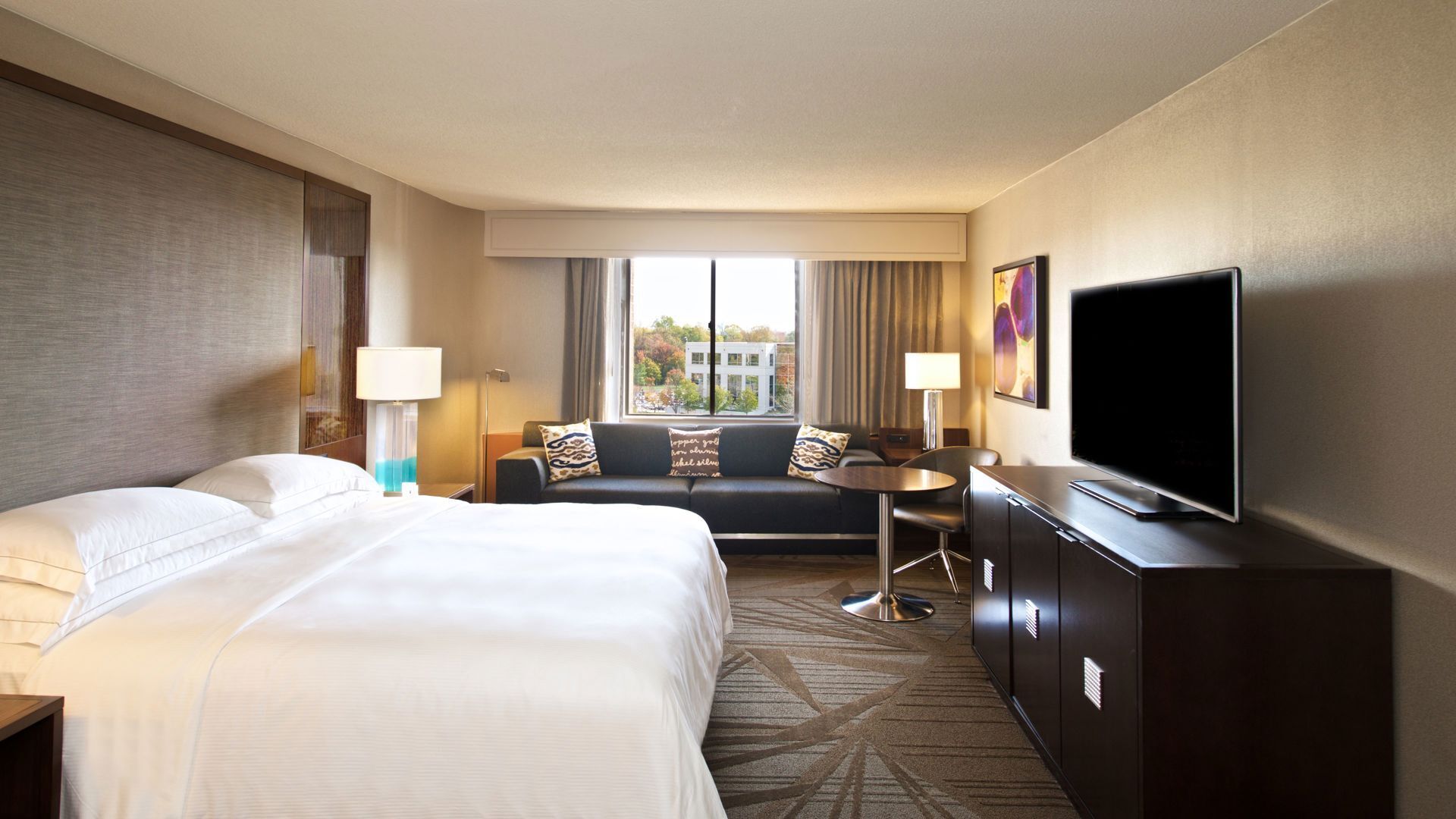 Premium bedding, down comforters, pillowtop beds, in-room safe