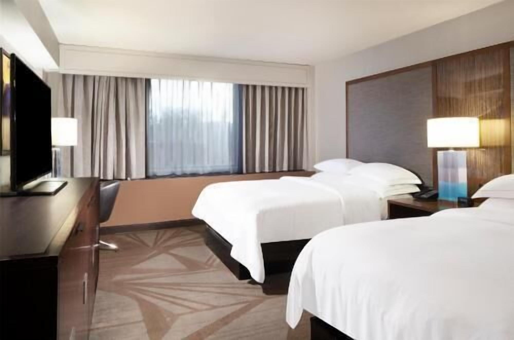 Premium bedding, down comforters, pillowtop beds, in-room safe