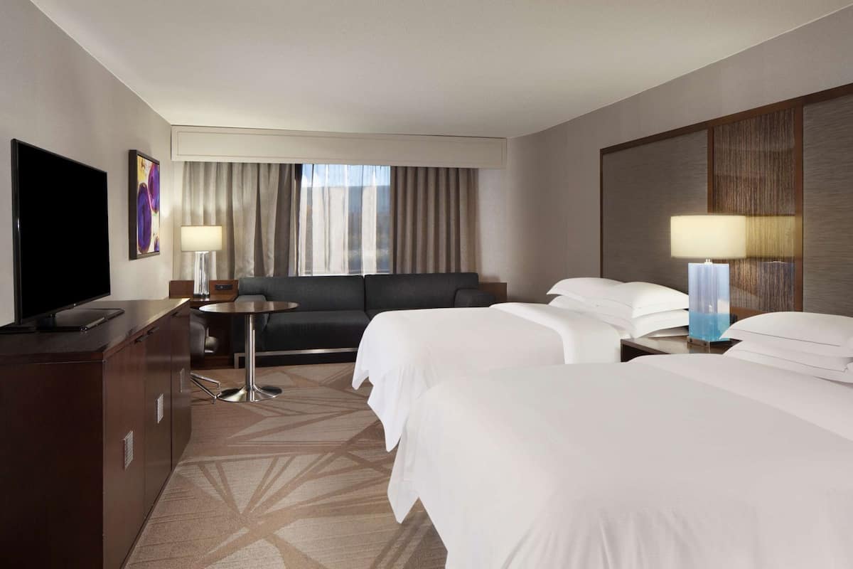Premium bedding, down comforters, pillowtop beds, in-room safe