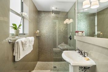 Shower, rainfall showerhead, free toiletries, hair dryer at Cavalier Hotel South Beach