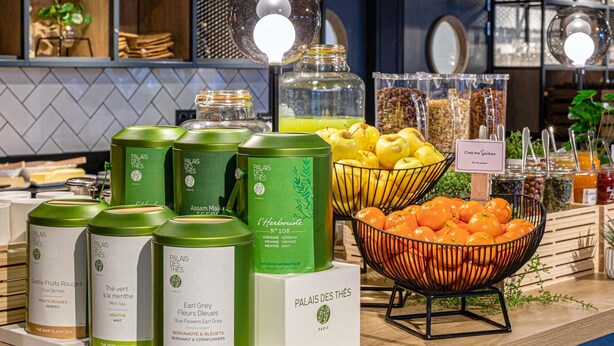 A breakfast buffet with various food items and tea options. - ibis Bordeaux Lac (Bordeaux)