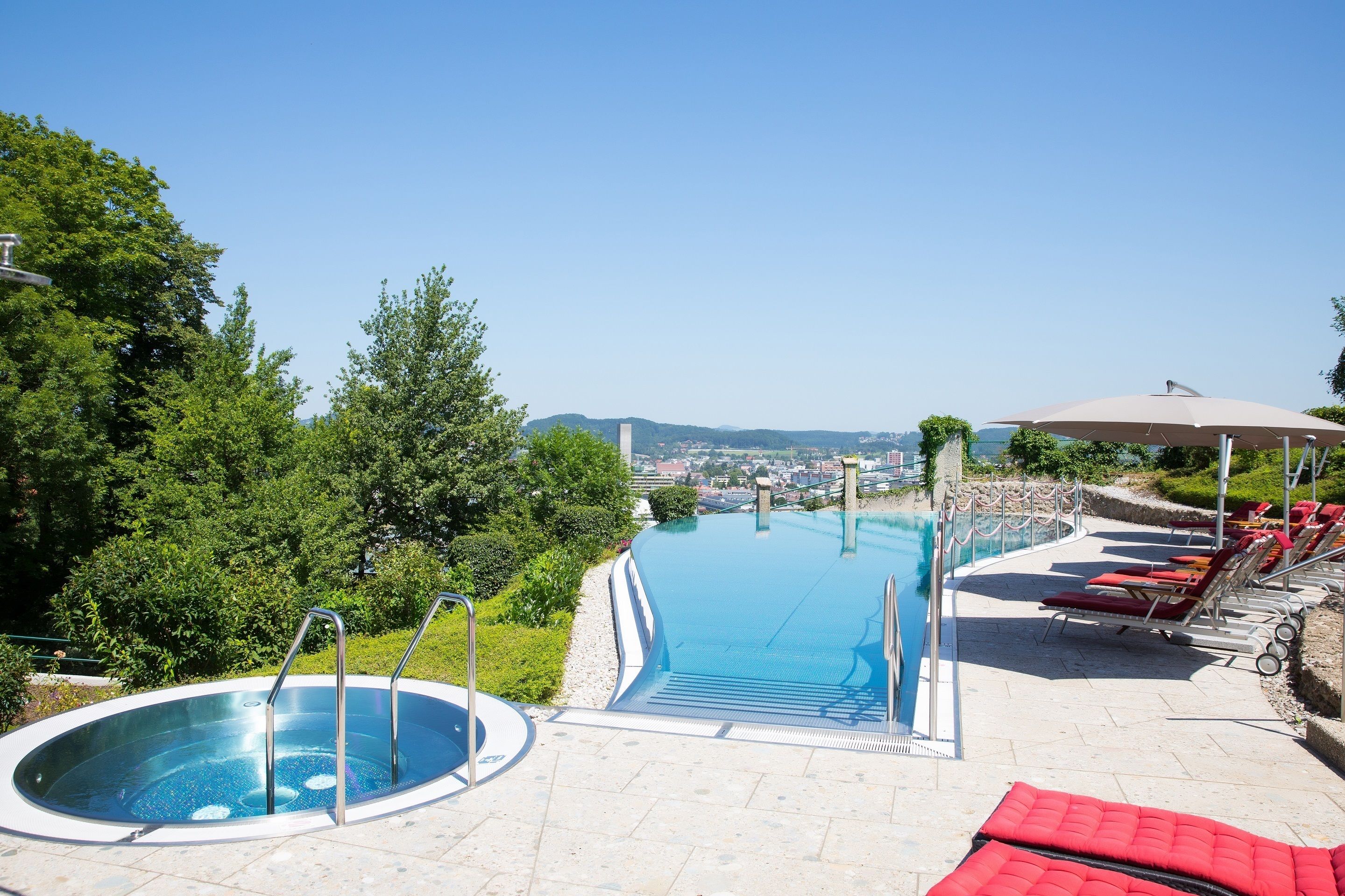 outdoor pool, pool umbrellas, pool loungers