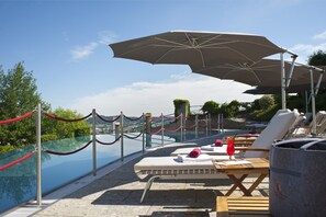 Outdoor pool, pool umbrellas, pool loungers