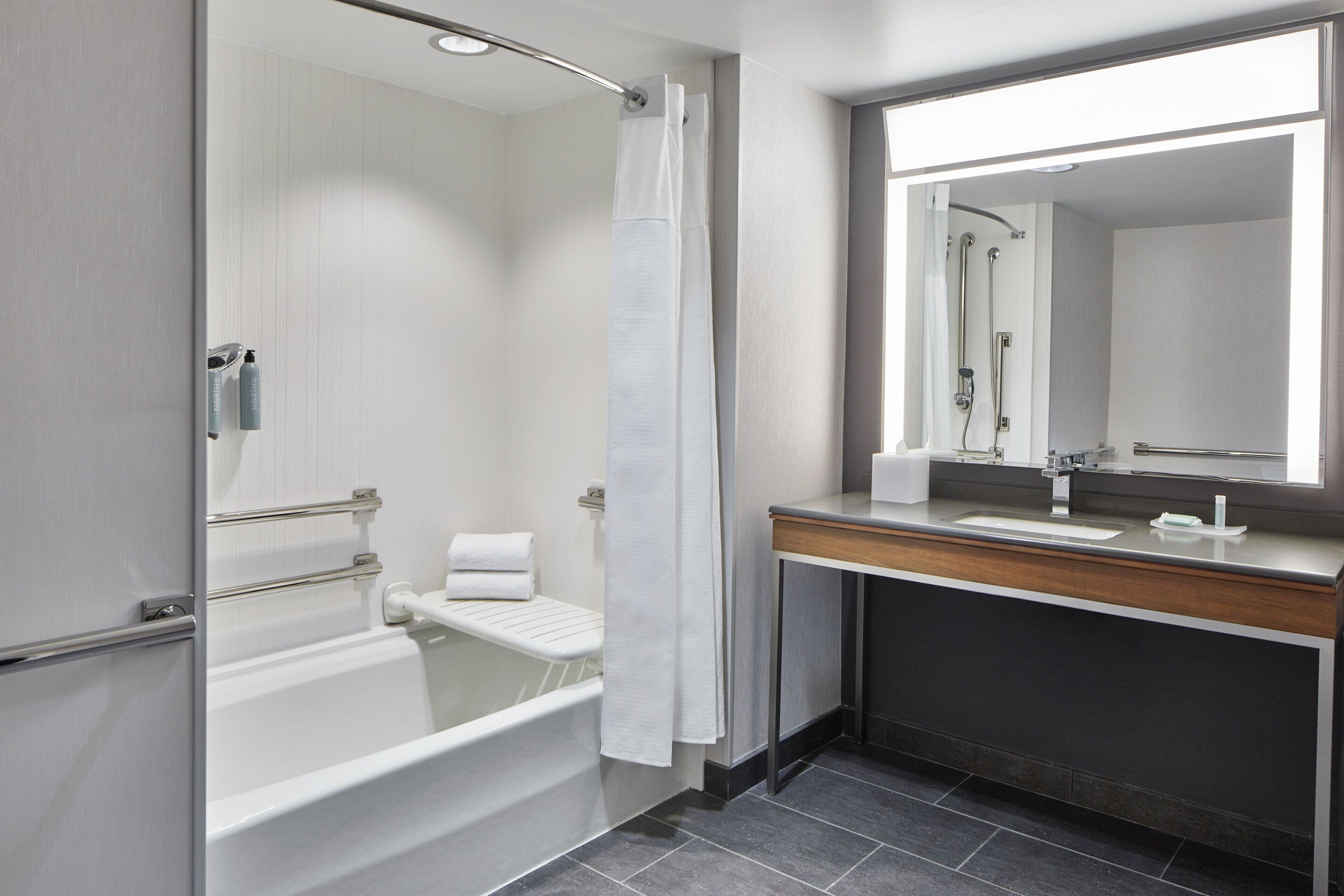 combined shower/bathtub, free toiletries, hair dryer, towels