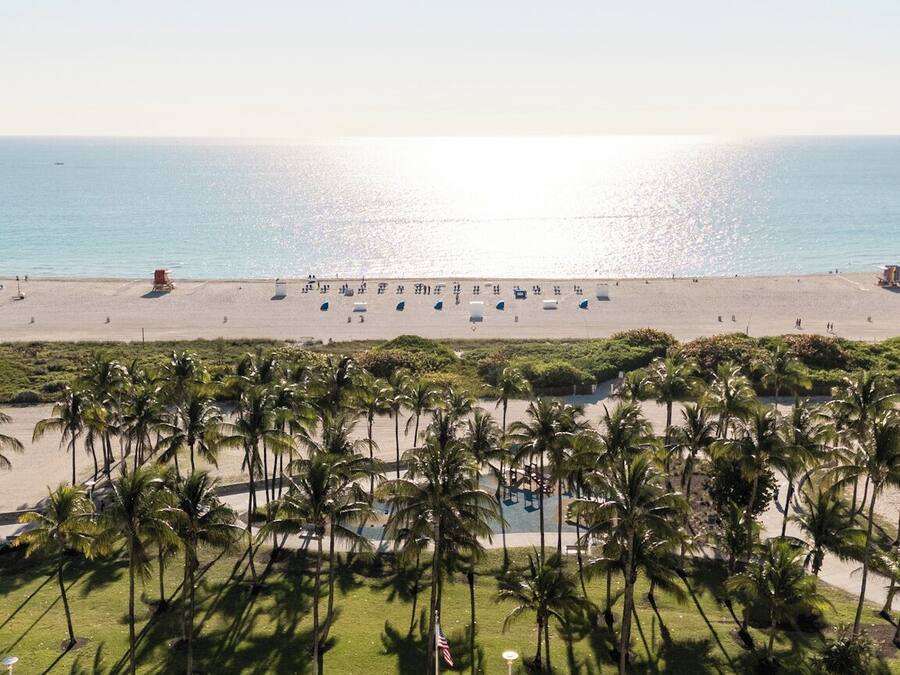 On the beach, sun-loungers, beach towels