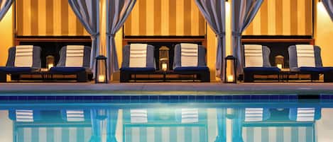 Seasonal outdoor pool, cabanas (surcharge), pool umbrellas