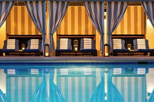 Seasonal outdoor pool, cabanas (surcharge), pool umbrellas
