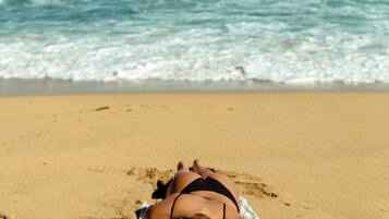 Beach nearby, beach umbrellas, beach towels