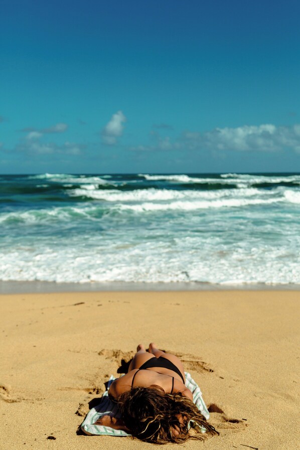 Beach nearby, beach umbrellas, beach towels