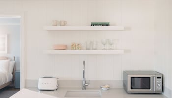 Suite, 2 Bedrooms (Balboa) | Private kitchenette | Fridge, eco-friendly cleaning products at Bay Shores Peninsula Hotel