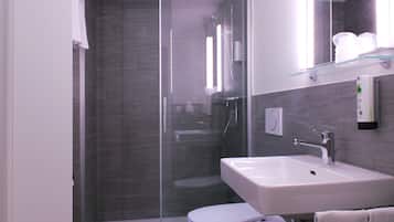 Hair dryer, heated floors, towels, soap