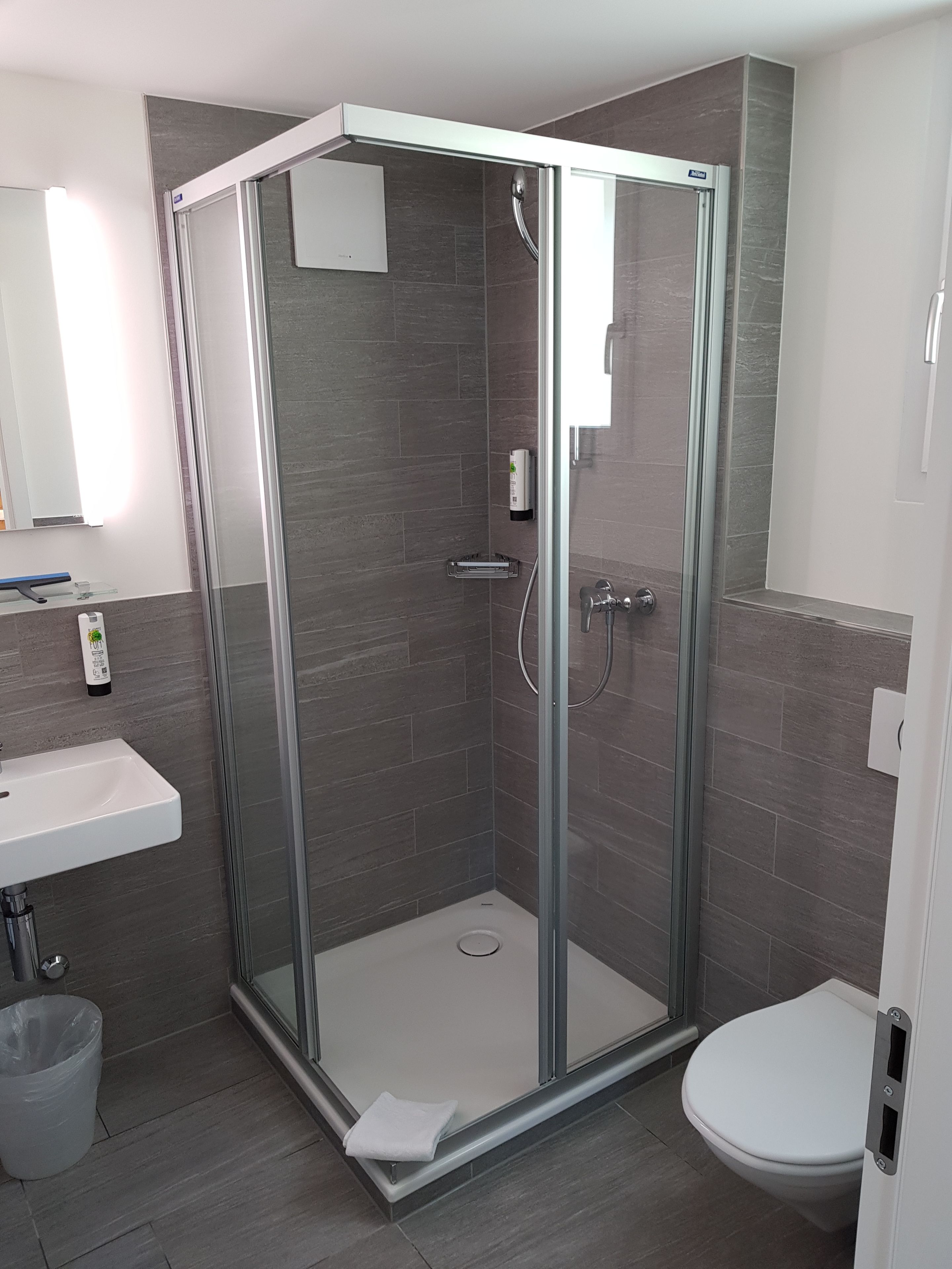 standard triple room | bathroom | hair dryer, heated floors, towels, soap