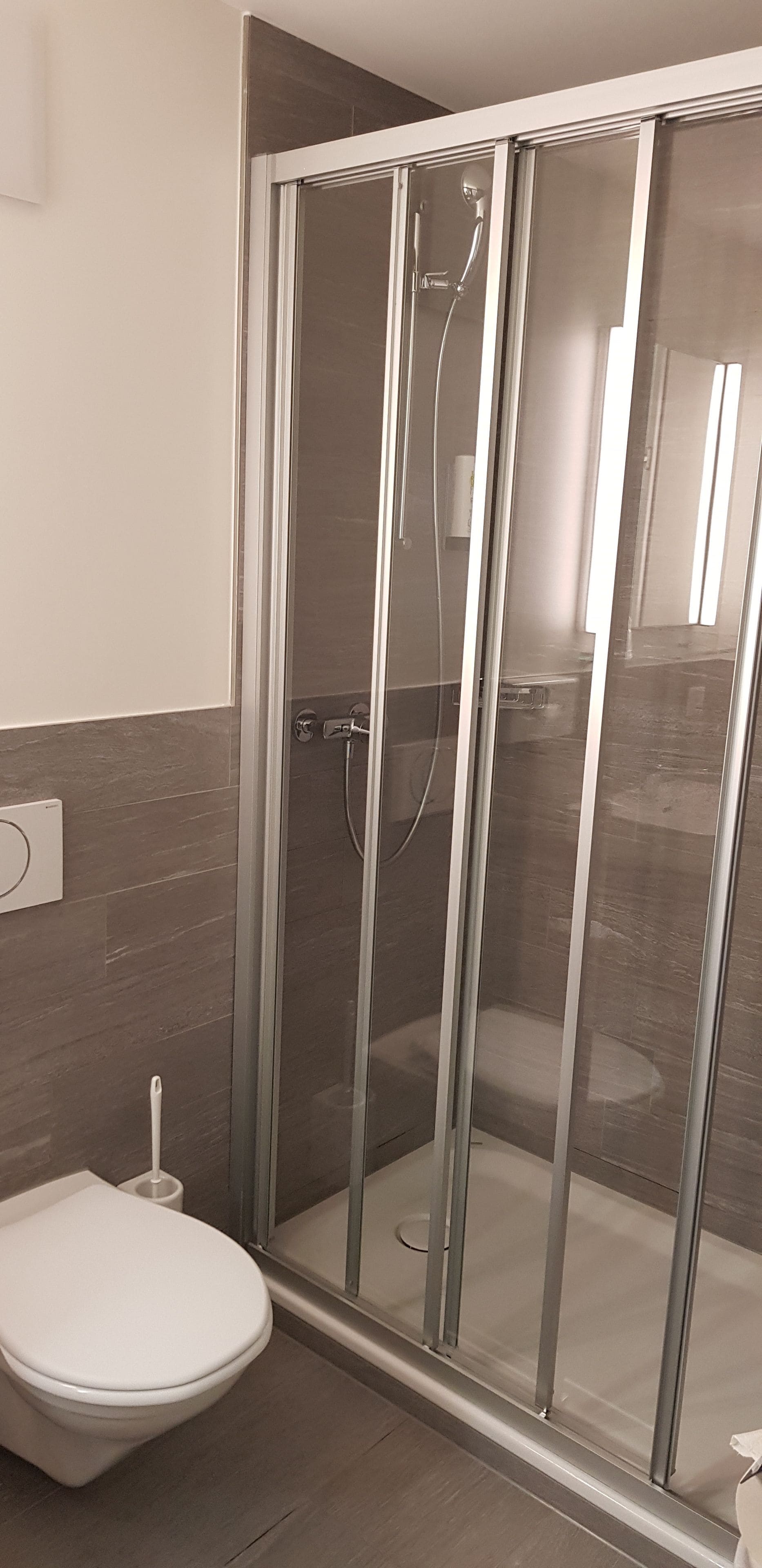 single room, 1 queen bed | bathroom | hair dryer, heated floors, towels, soap