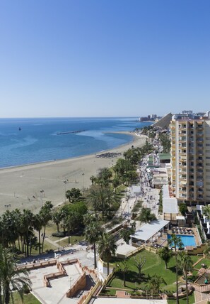 On the beach, sun-loungers, beach bar