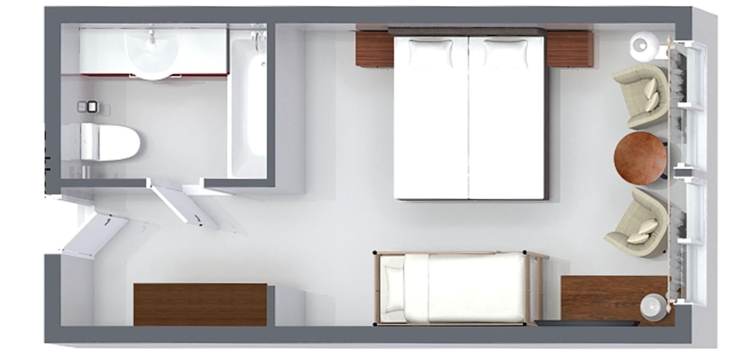 A hotel room layout with a bed, a desk, a chair, a sofa, a small table, and a bathroom.