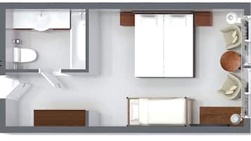 A hotel room layout with a bed, a desk, a chair, a sofa, a small table, and a bathroom.