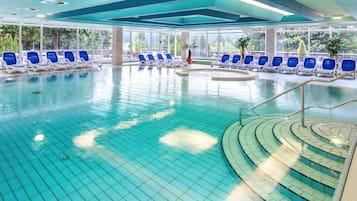 Indoor pool, open 7:00 AM to 10:00 PM, pool loungers