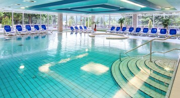 Indoor pool, open 7:00 AM to 10:00 PM, sun loungers