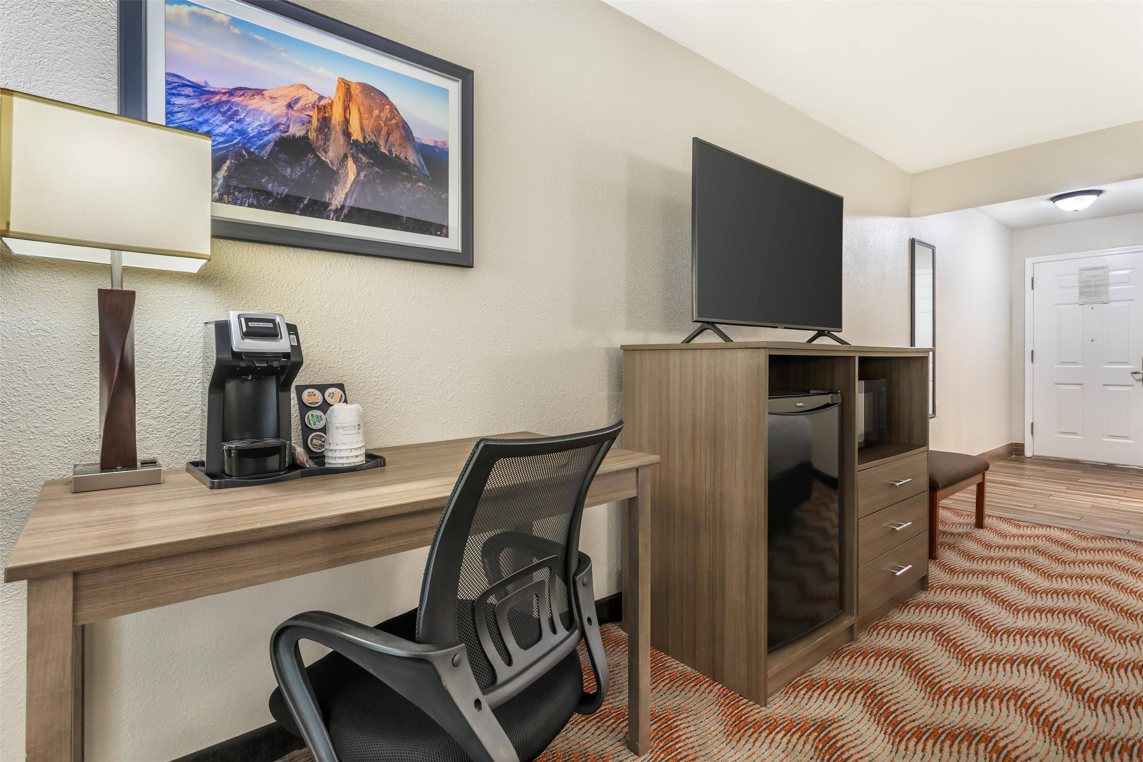 desk, blackout curtains, iron/ironing board, free cots/infant beds