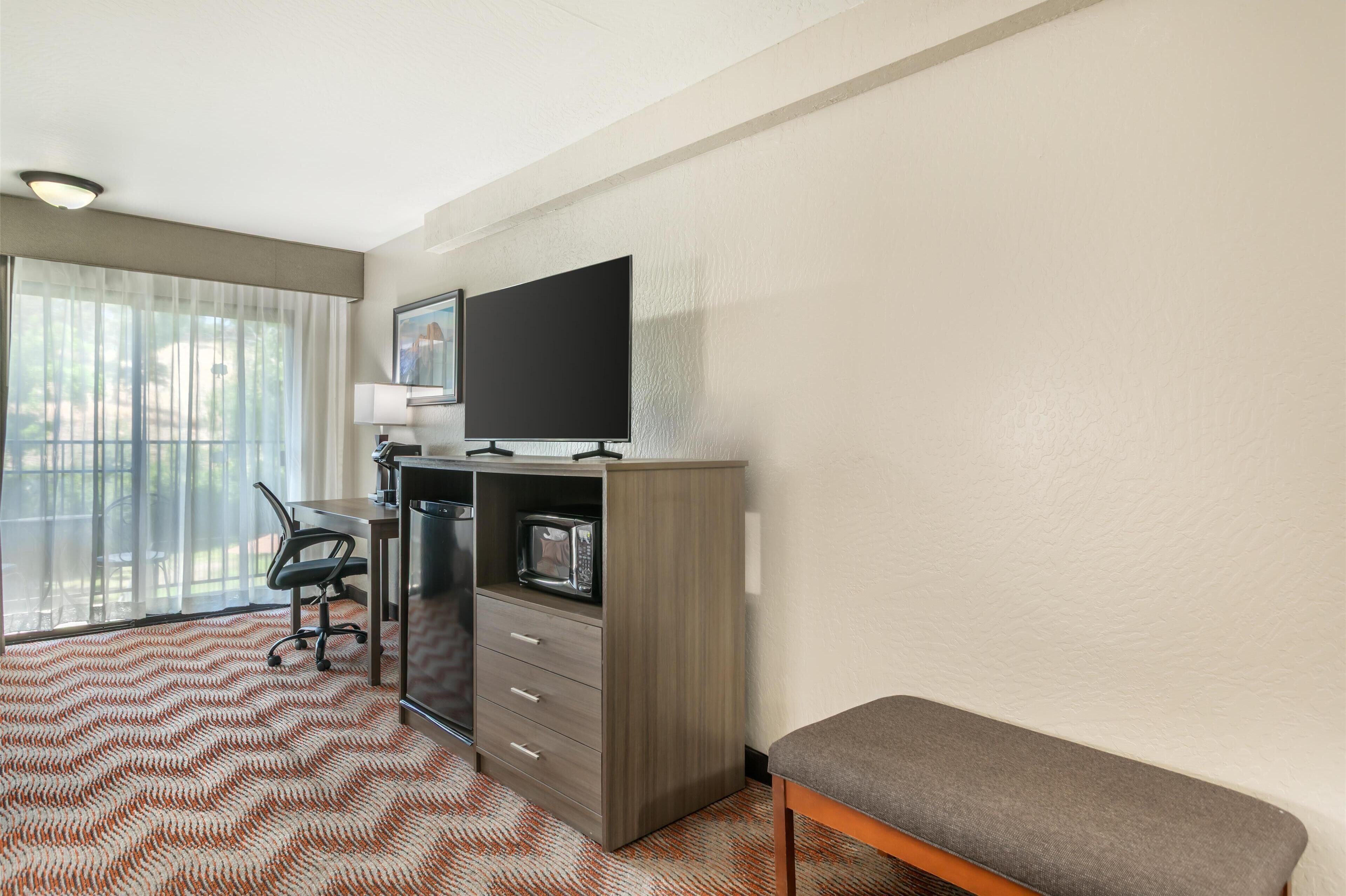 suite, 2 queen beds, non smoking, refrigerator & microwave (with sofabed) | desk, blackout curtains, iron/ironing board, free cots/infant beds