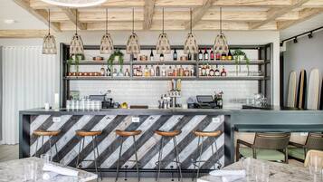 3 bars/lounges, poolside bar, beach bar