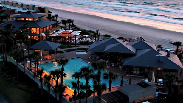 A resort with a swimming pool, beach view, and multiple buildings. - Sawgrass Marriott Golf Resort & Spa (Ponte Vedra Beach)