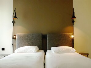 Standard Room, 2 Twin Beds | Down comforters, desk, blackout drapes, iron/ironing board
