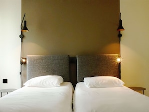 Standard Room, 2 Twin Beds | Down comforters, desk, blackout drapes, iron/ironing board