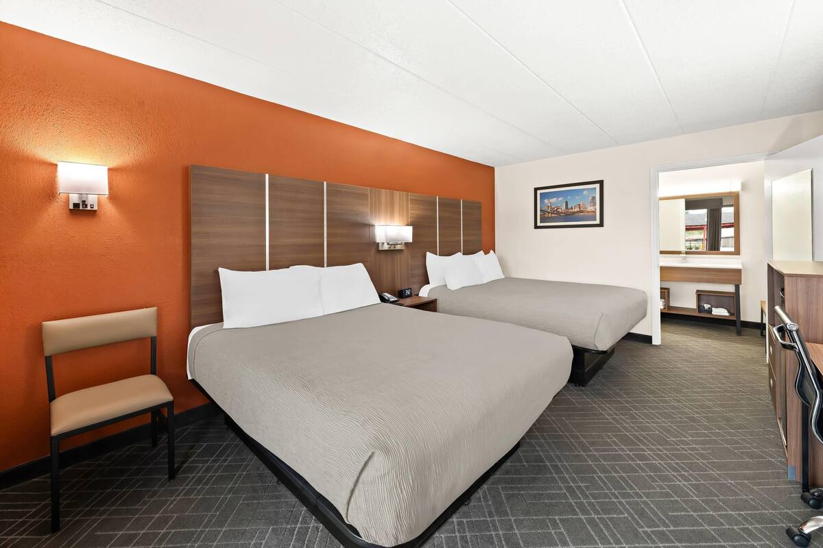 Standard Room, 2 Queen Beds, Non Smoking | Desk, laptop workspace, blackout drapes, iron/ironing board