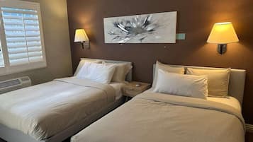 Economy Studio Suite | 1 bedroom, desk, iron/ironing board, free WiFi