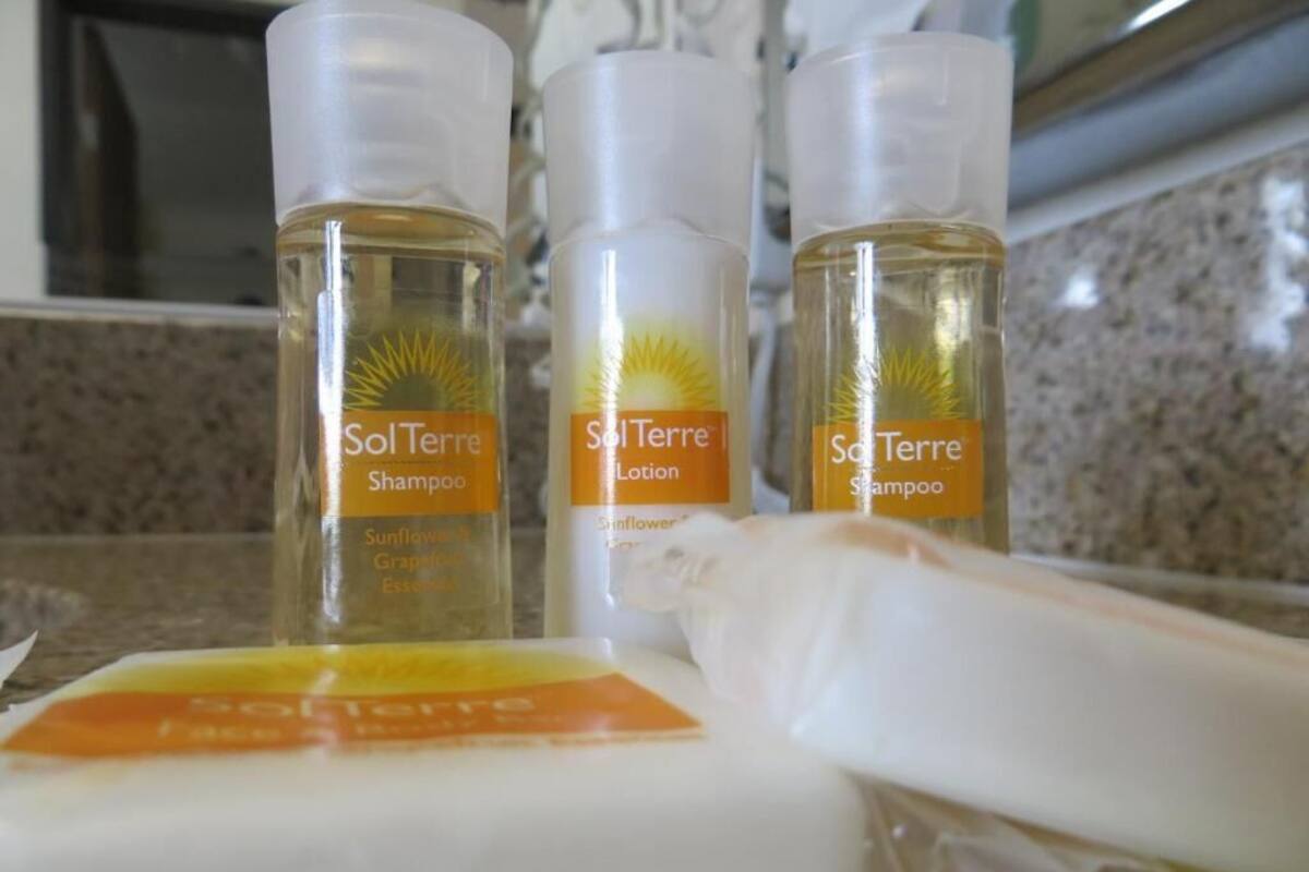 Three bottles of SolTerre products on a countertop.
