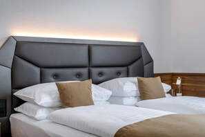Hypo-allergenic bedding, in-room safe, desk, laptop workspace