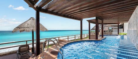 Outdoor pool, pool umbrellas, sun loungers