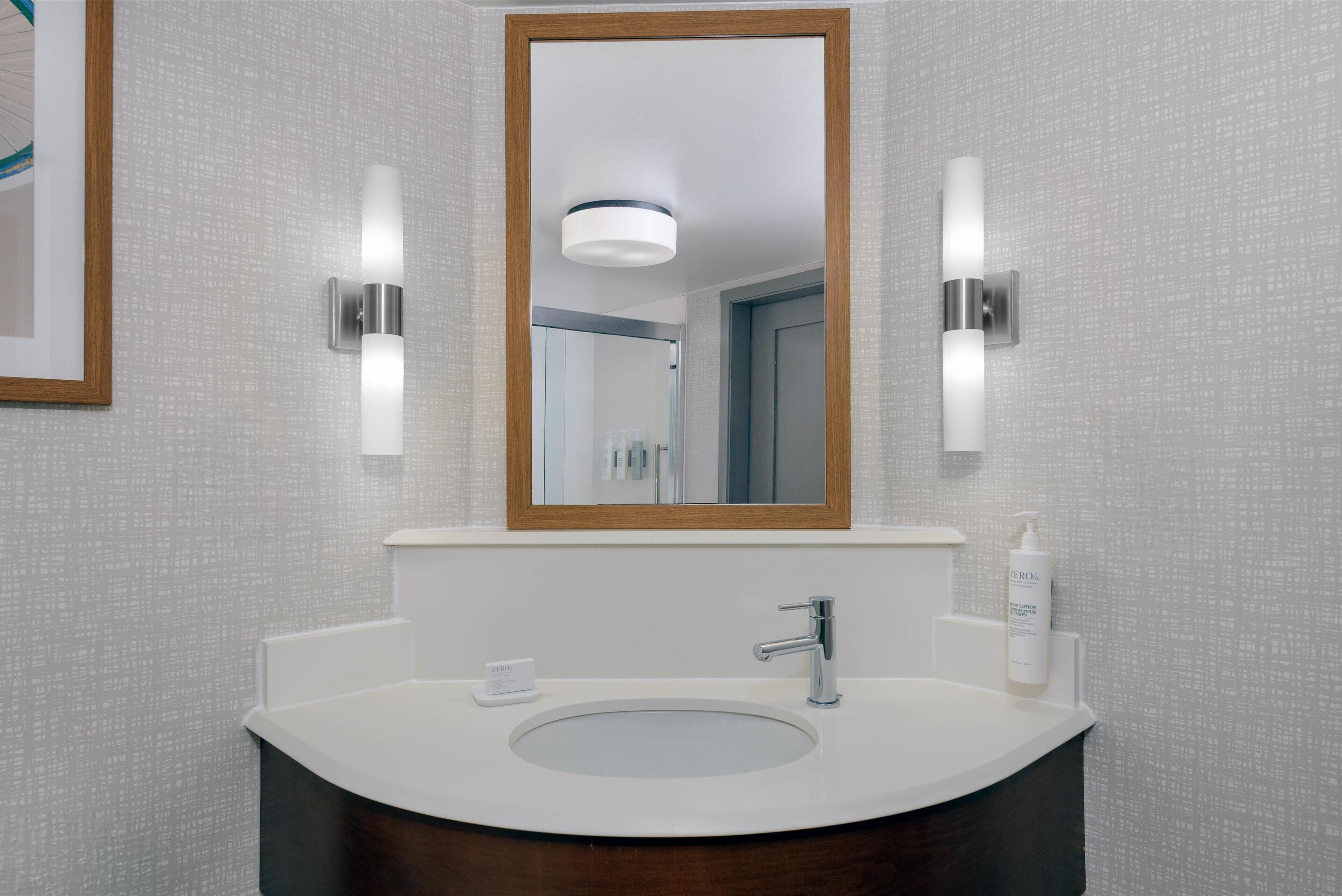 deluxe, one king bed, pullout couch, non-smoking | bathroom | free toiletries, hair dryer, towels