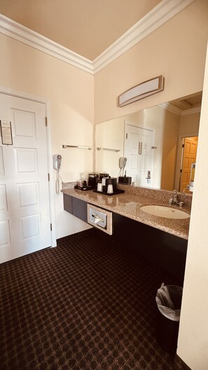 Hair dryer, towels, soap, shampoo