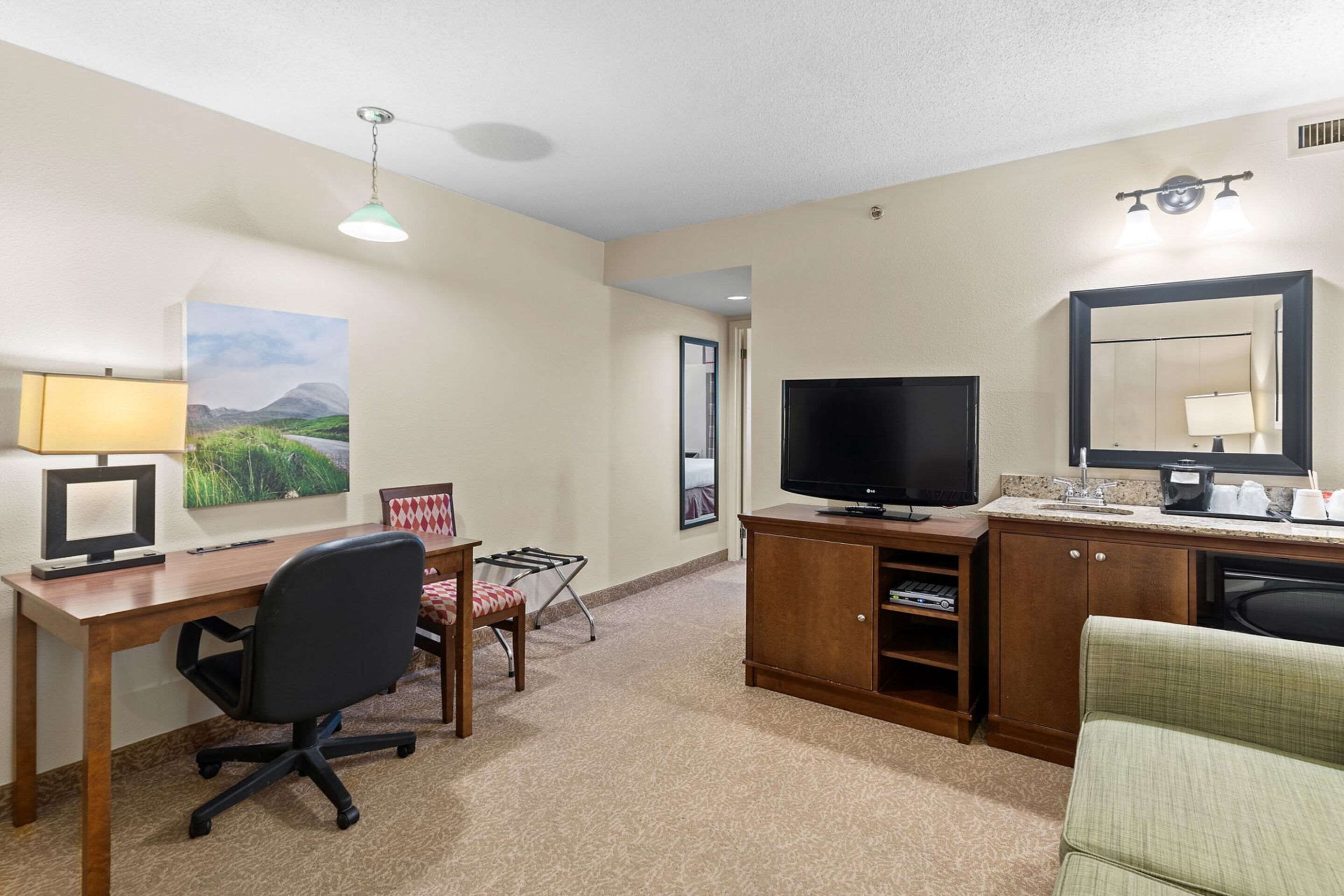 premium bedding, pillow-top beds, desk, laptop workspace